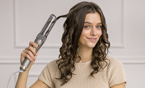 STEP 3 - After the beep, slowly release the curl downward