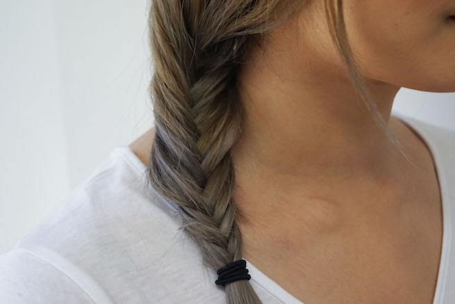 Side photo of fishtail braid hairstyle