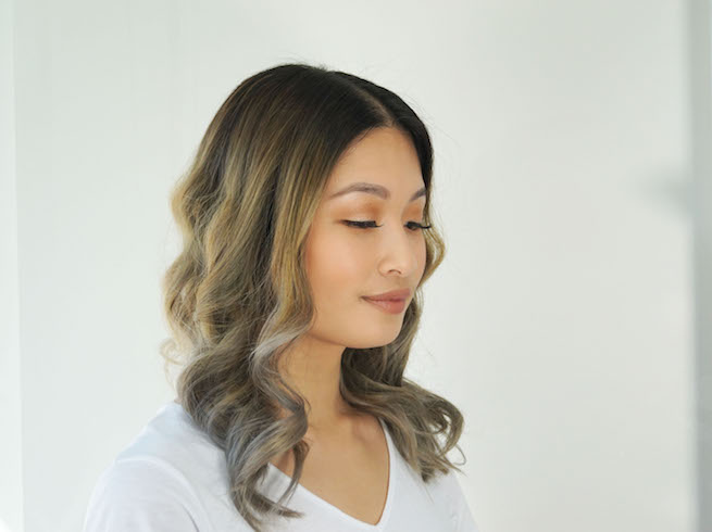 woman with curled brown hair