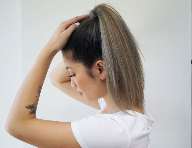Profile shot of woman with sleek ponytail hairstyle