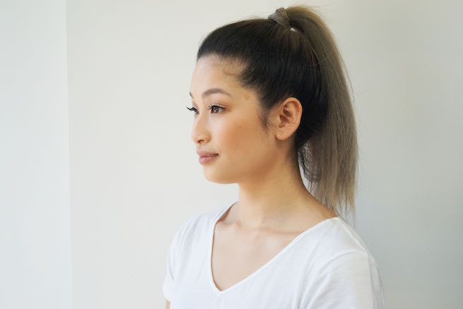 Profile shot of woman with sleek ponytail hairstyle
